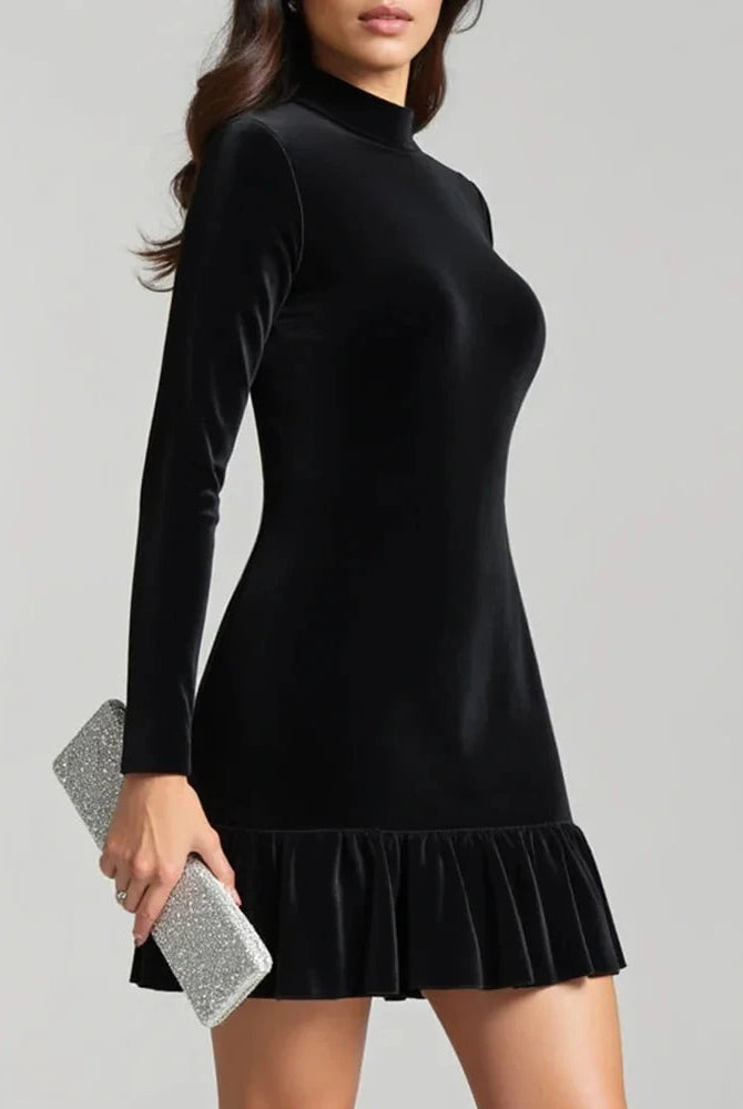 Black velvet mini dress by Lumina Wear featuring a high neck and fitted silhouette, displayed on a mannequin.