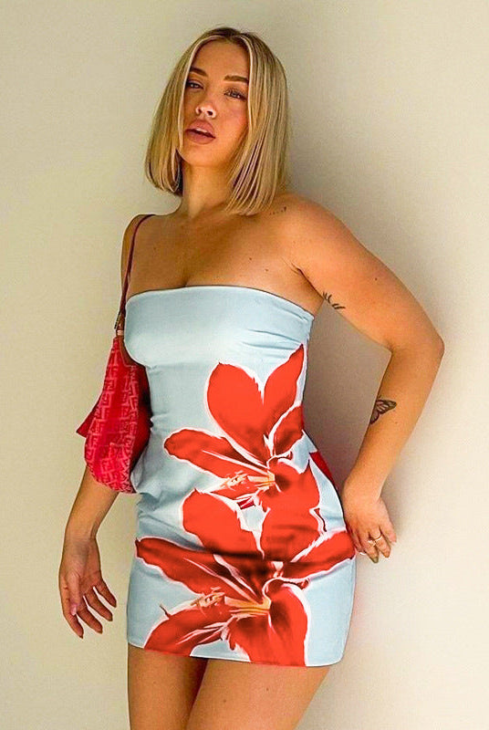 Blue strapless floral mini dress by Lumina Wear, featuring a fitted silhouette and lightweight fabric, perfect for summer occasions.