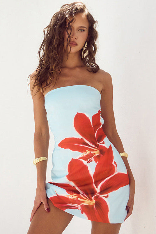 Lumina Wear Skadi strapless mini dress with a blue floral pattern, featuring a fitted style and sleeveless design.