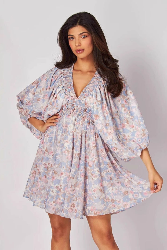 Blue Elara chiffon short floral dress by Lumina Vancouver, featuring a mini dress style with a flowy, lightweight fabric.