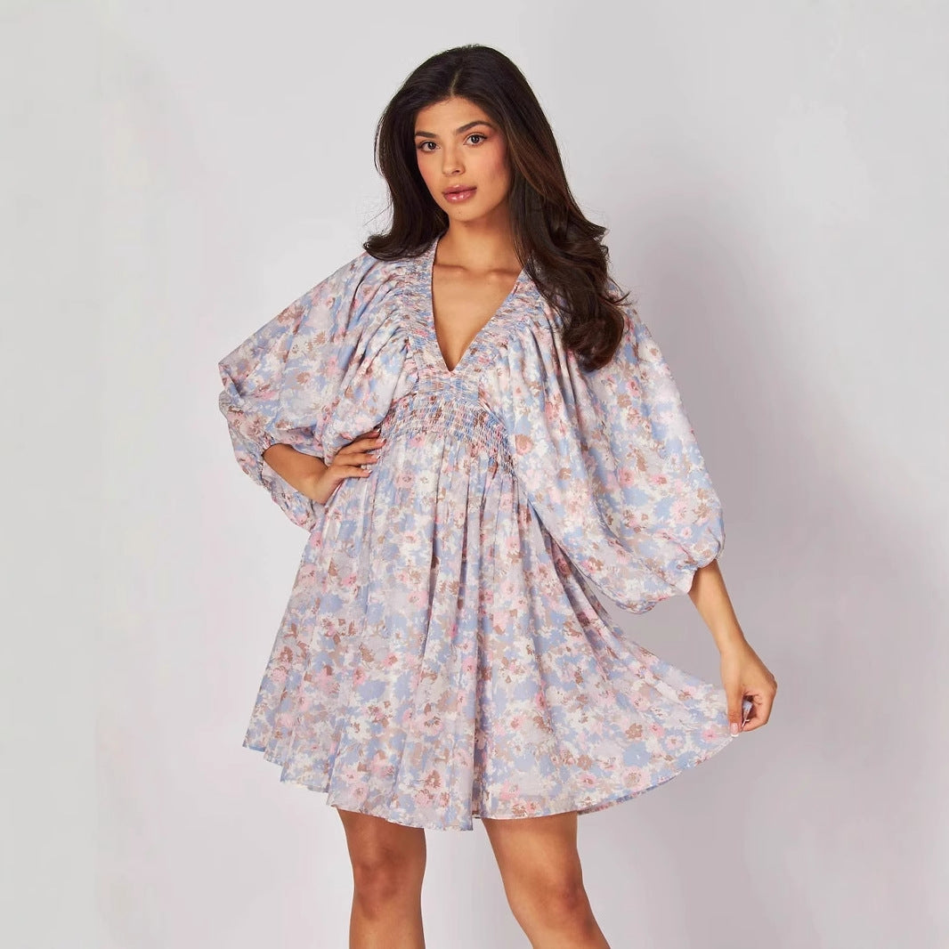 Blue Elara chiffon short floral dress by Lumina Vancouver, featuring a mini dress style with a flowy, lightweight fabric.