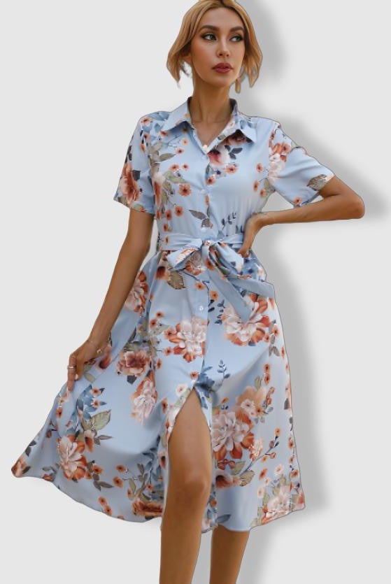 Blue Elara shirt dress by Lumina Vancouver featuring a button-down front and floral print, perfect for casual or semi-formal wear.