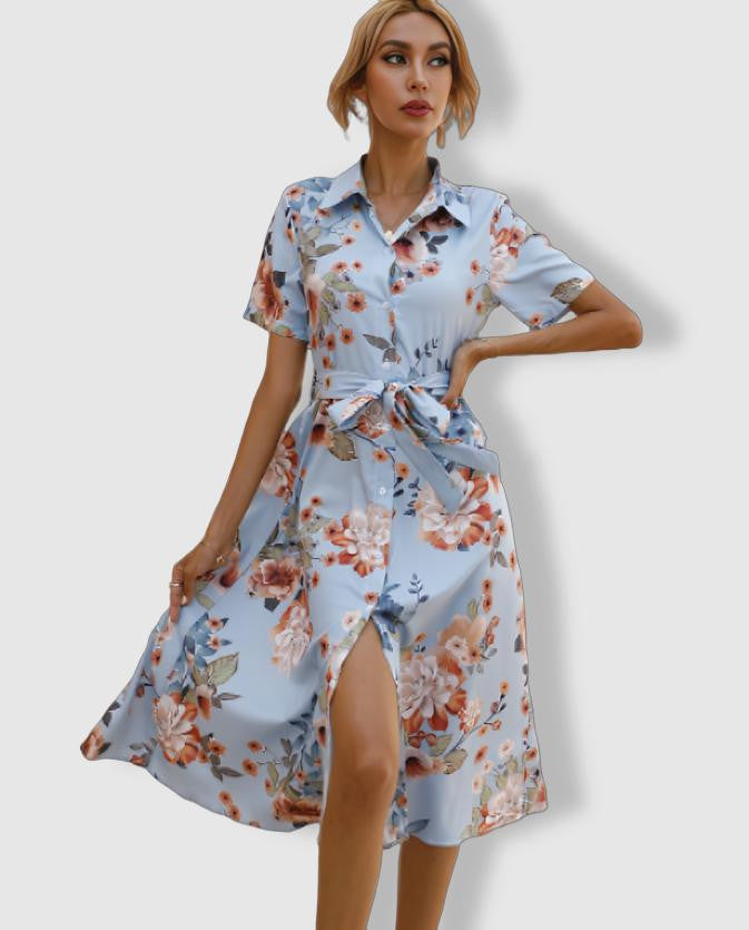 Blue Elara shirt dress by Lumina Vancouver featuring a button-down front and floral print, perfect for casual or semi-formal wear.
