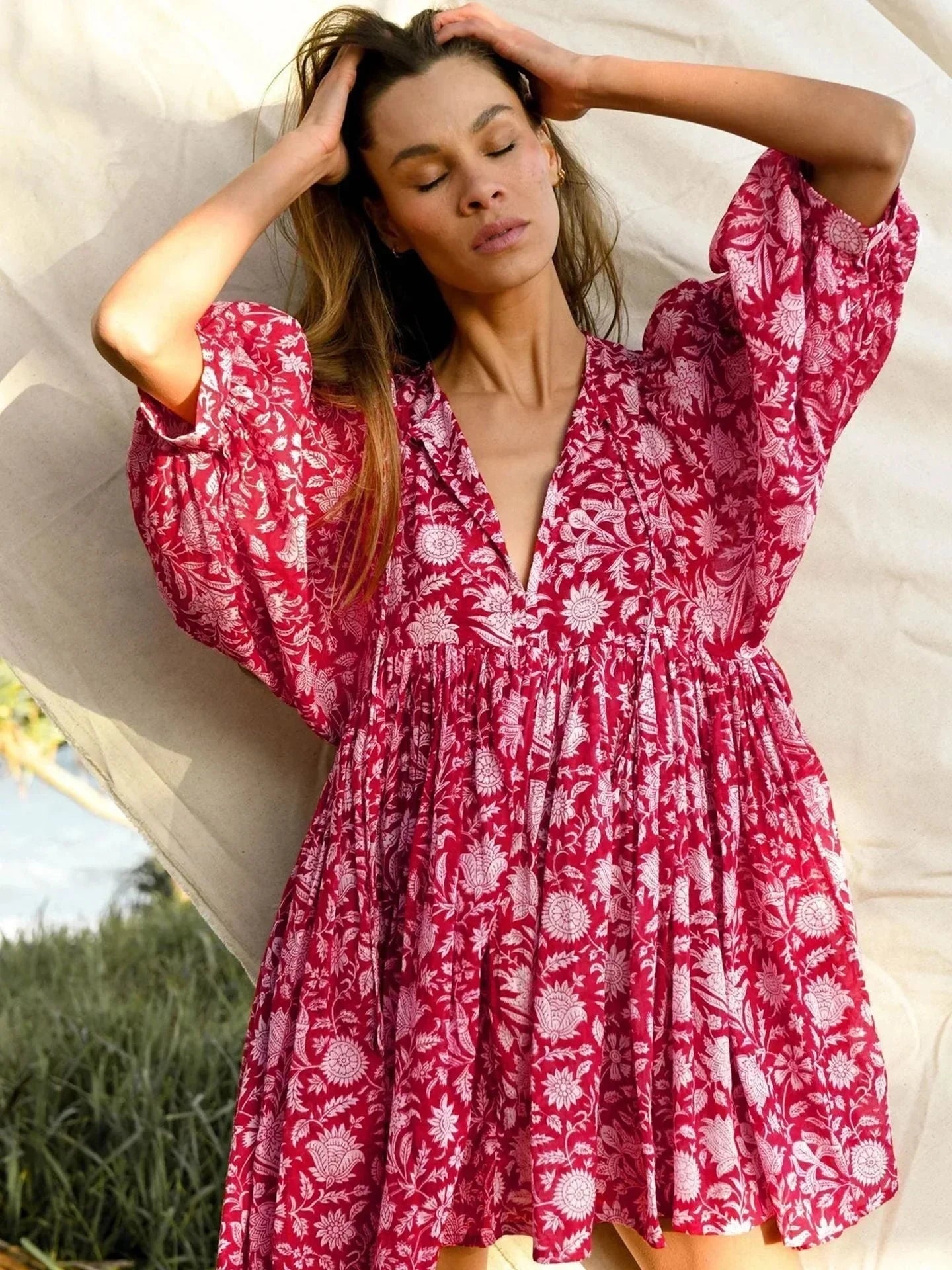 Blue Aurora Flow Boho Floral mini dress for women by Lumina Vancouver, featuring a flowy, bohemian floral design.