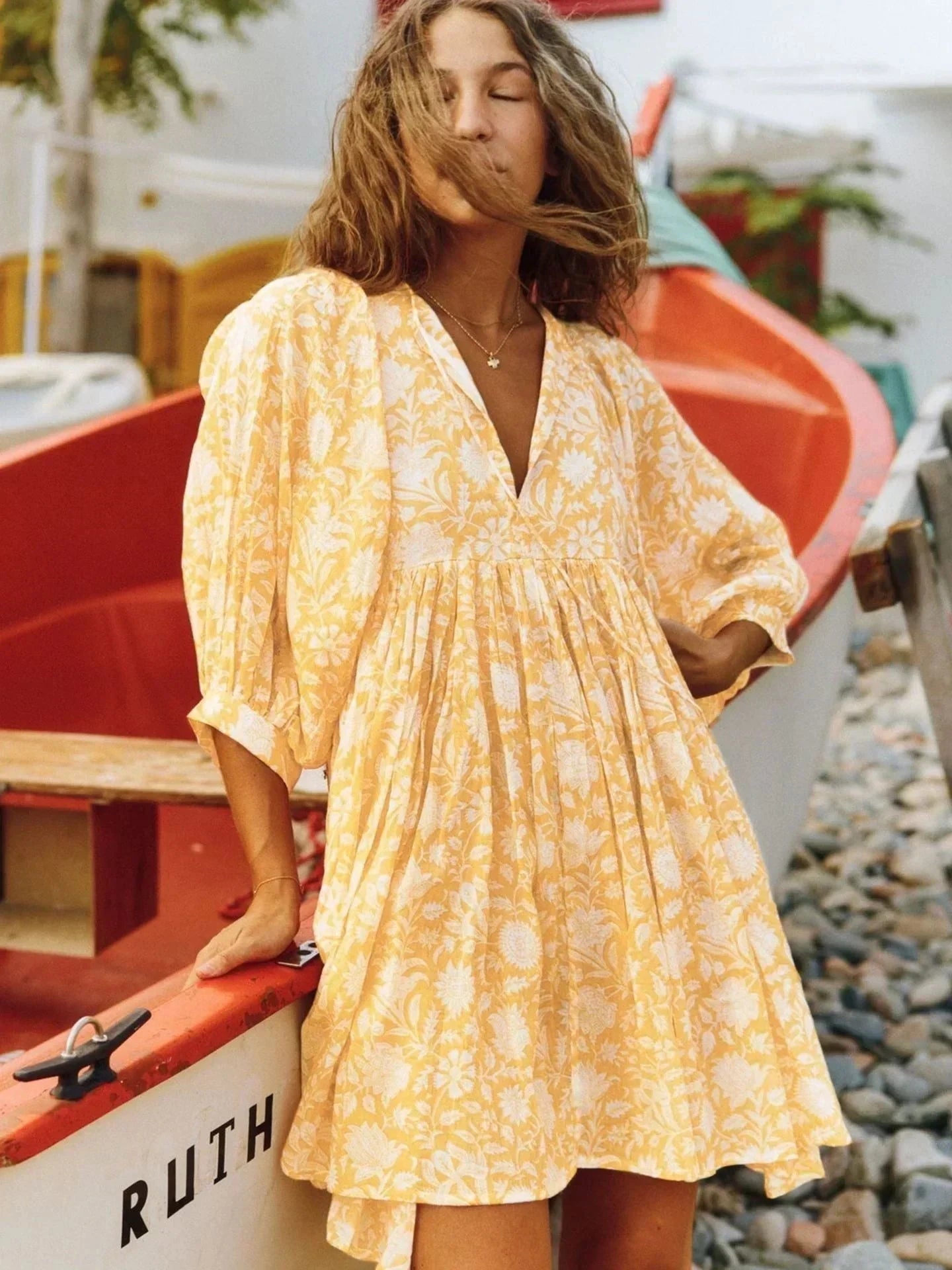 Blue Aurora Flow Boho Floral mini dress for women by Lumina Vancouver, featuring a relaxed bohemian style with floral prints.