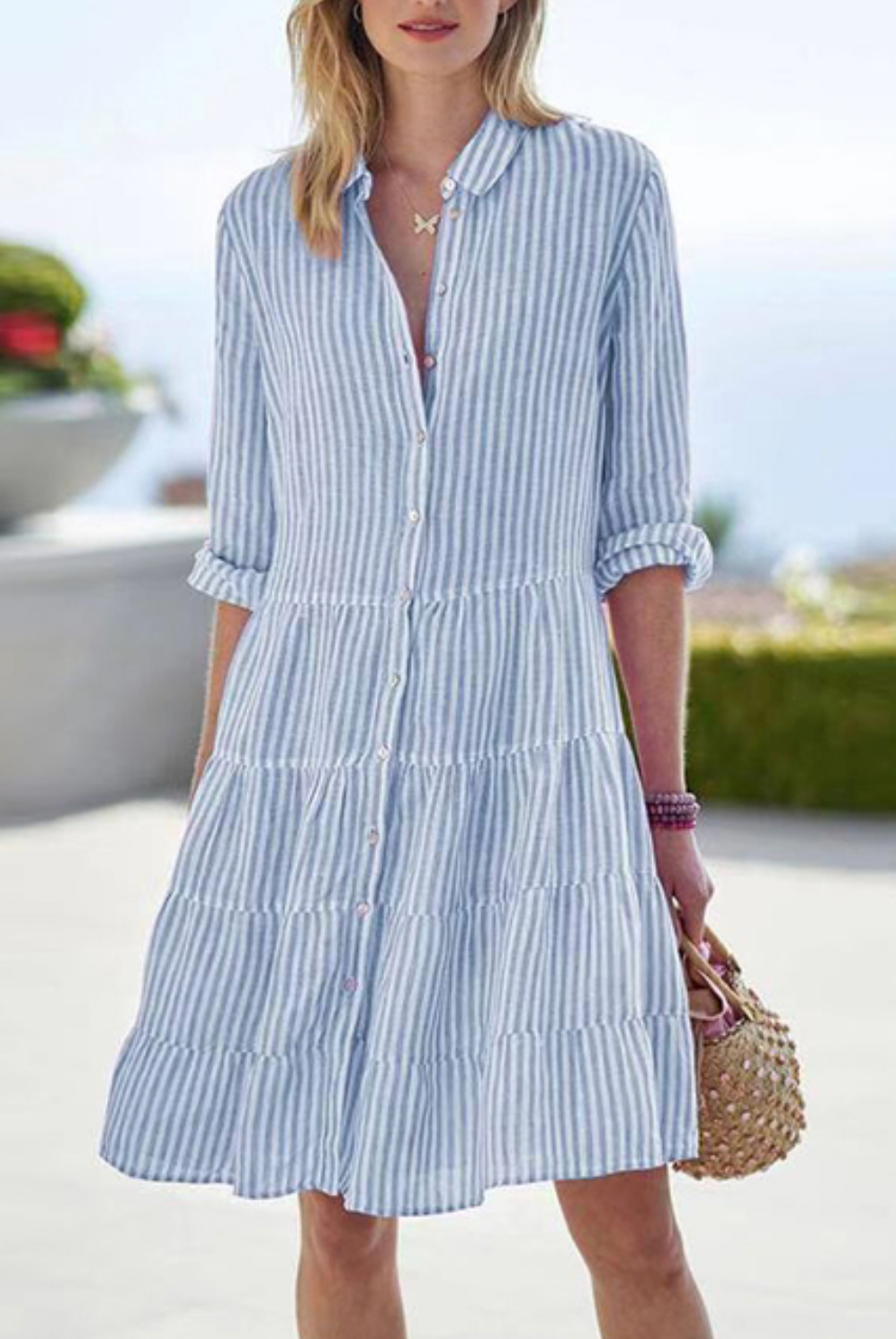 Green Astraea striped button-up mini dress by Lumina Vancouver, featuring a fitted silhouette and classic collar.