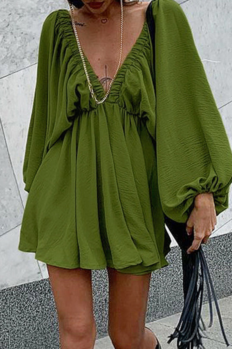 Green Camellia Lantern-Sleeve Mini Dress with deep V-neck by Lumina Vancouver, styled with flowing lantern sleeves.