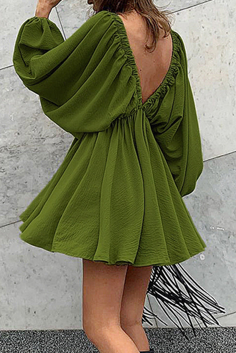 Green Lumina Vancouver Camellia mini dress with lantern sleeves and deep V-neck, stylish and elegant for any occasion.