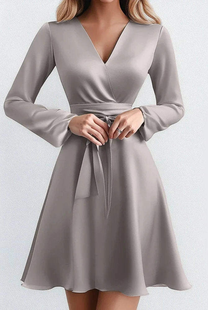 Light coffee-colored Lumina Wear mini dress featuring a Serene Amethyst Dream wrap design, perfect for elegant casual wear.