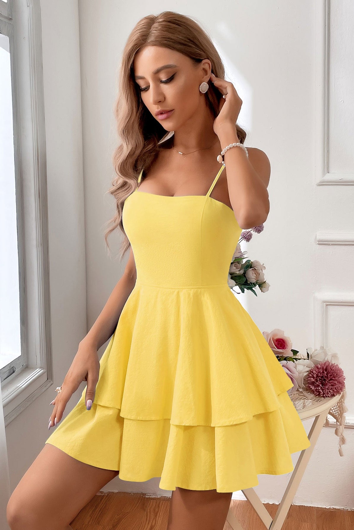 Light green Lumina Vancouver sleeveless mini dress by Lumina Wear, fitted style, shown on a model against a neutral background.