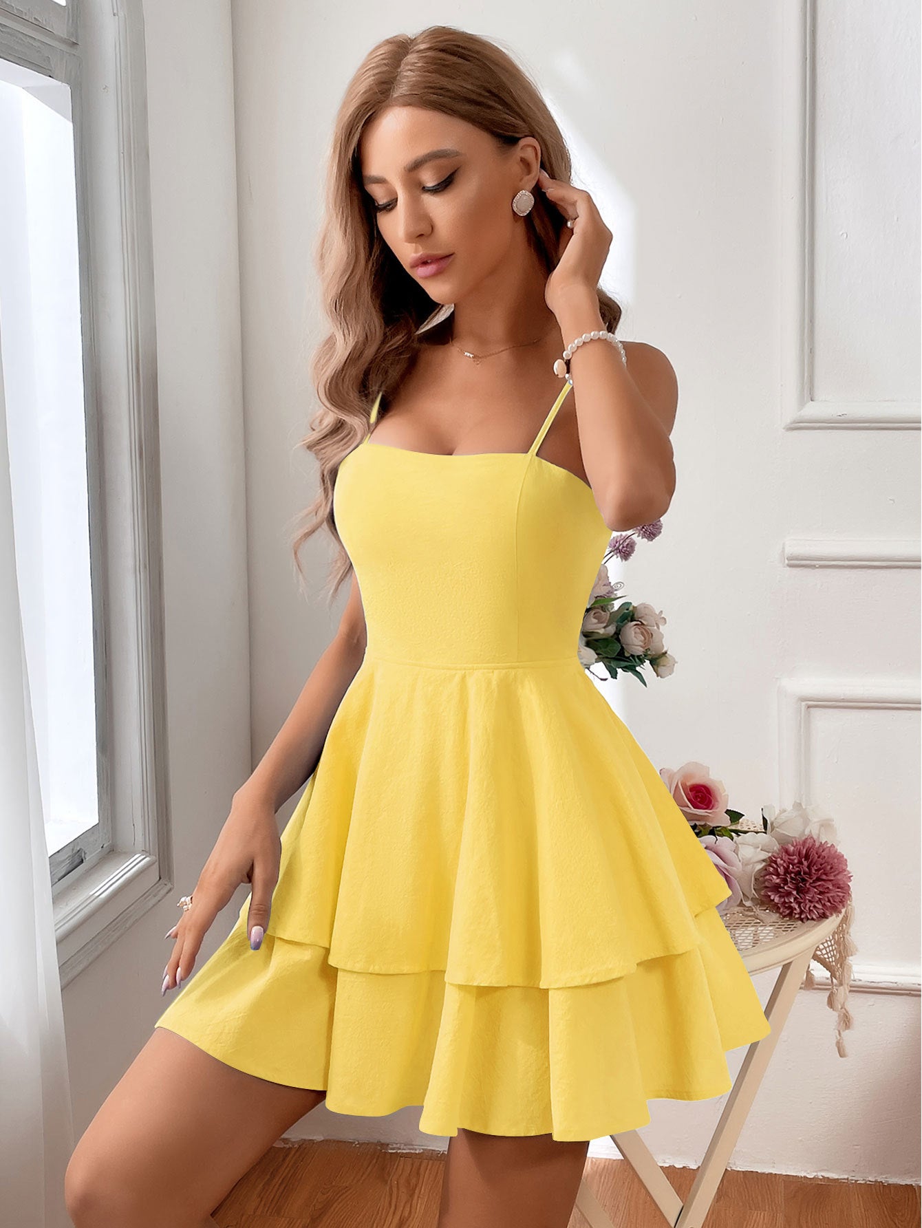 Light green Lumina Vancouver sleeveless mini dress, casual style, shown on a model with a fitted silhouette and minimal accessories.