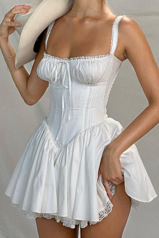 Navy blue Anja satin mini dress by Lumina Wear with open back, fitted silhouette, and sleeveless design for women.