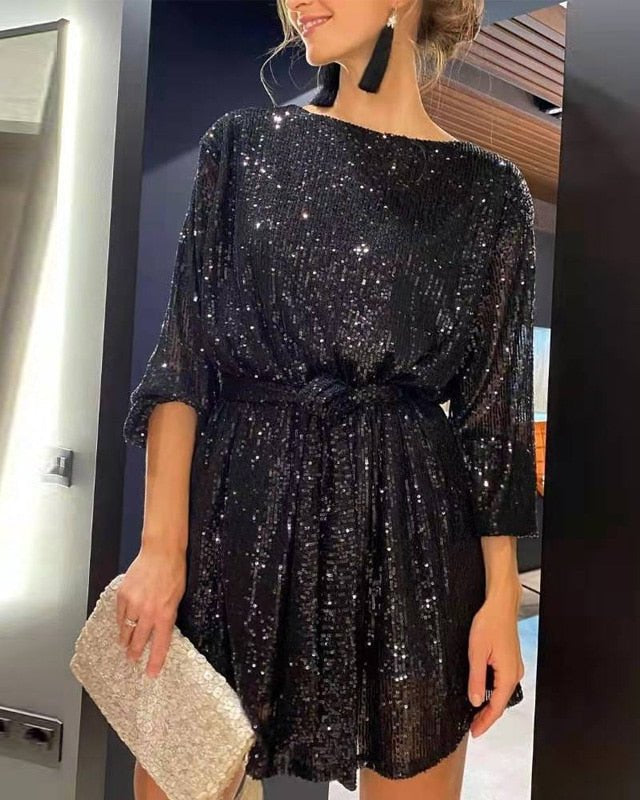 Black Aria Sapphire sequin mini dress by Lumina Wear, featuring a fitted silhouette and elegant neckline, perfect for evening wear.