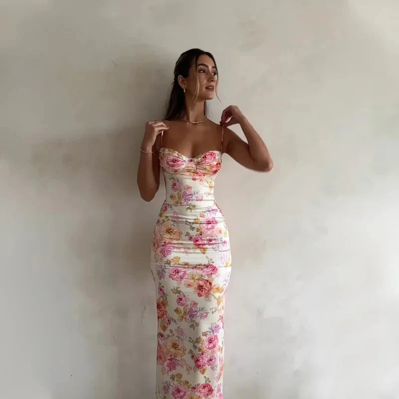 Charline Rosehaven Lumina Vancouver mini bodycon dress in pink, fitted style with sleeveless design and elegant neckline.