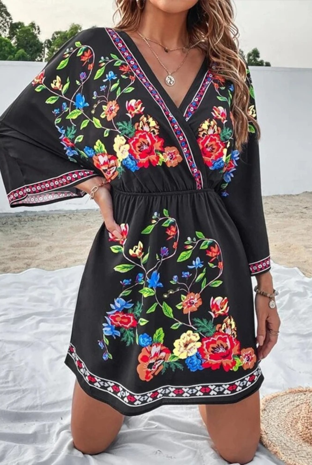 Pink and red floral print mini dress with V-neck from Lumina Vancouver, featuring a stylish and feminine design.