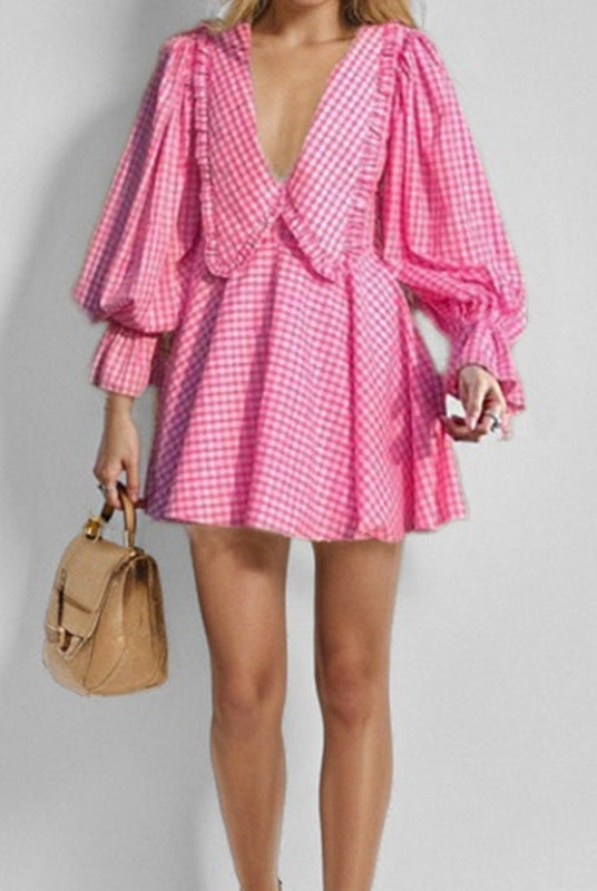 Pink Astra Mini Dress by Lumina Vancouver featuring cotton fabric and V-neck design with gingham pattern.