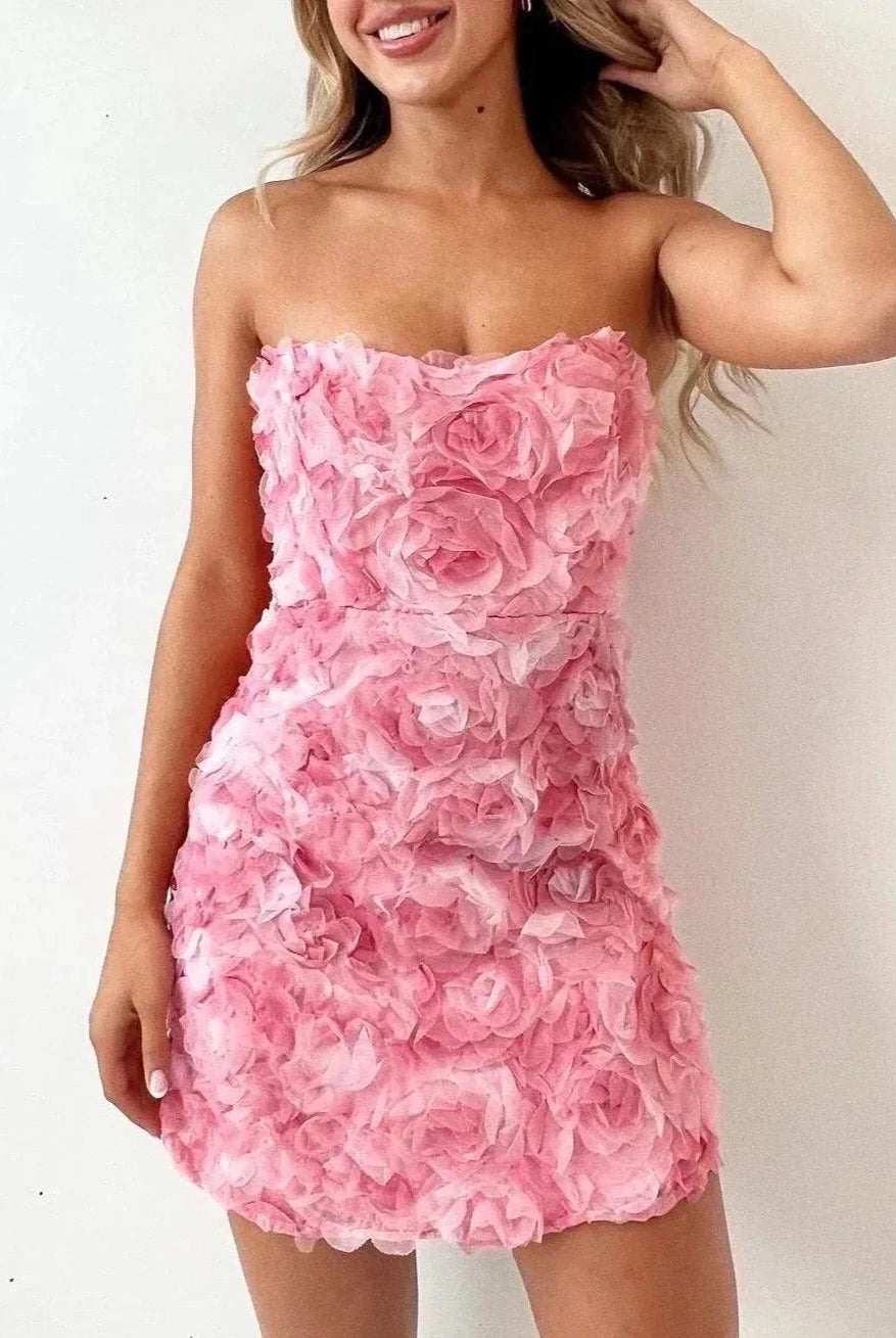 Pink Celestiana strapless mini dress by Lumina Vancouver, showcasing a fitted silhouette and elegant design.