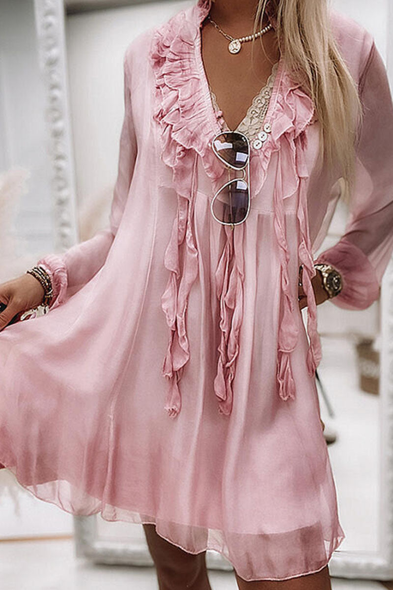 Pink knee-length flowy mini dress with V-neck from Lumina Vancouver, featuring a relaxed fit and lightweight fabric.