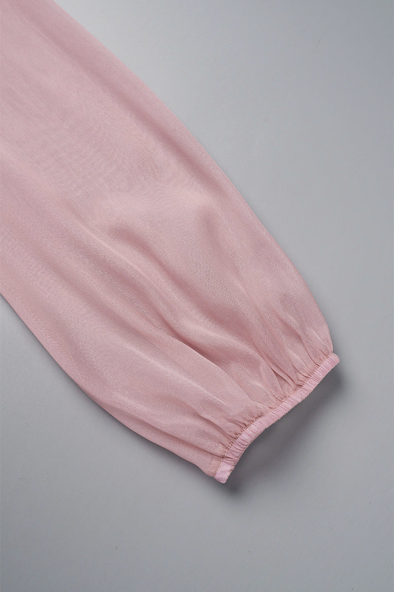 Pink knee-length flowy mini dress with V-neck from Lumina Vancouver, featuring a relaxed fit and lightweight fabric.