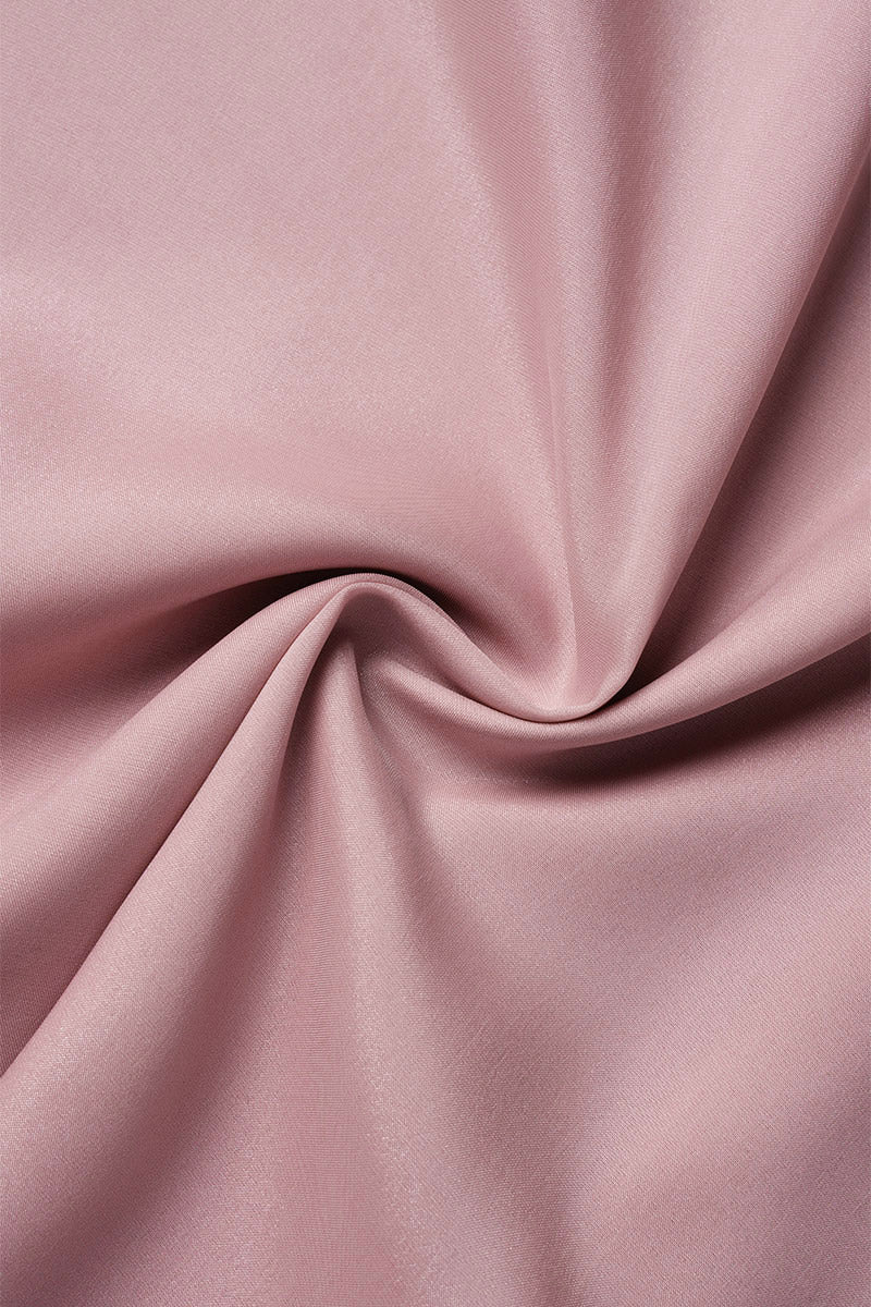 Pink knee-length flowy mini dress with V-neck from Lumina Vancouver, featuring a lightweight, elegant design.