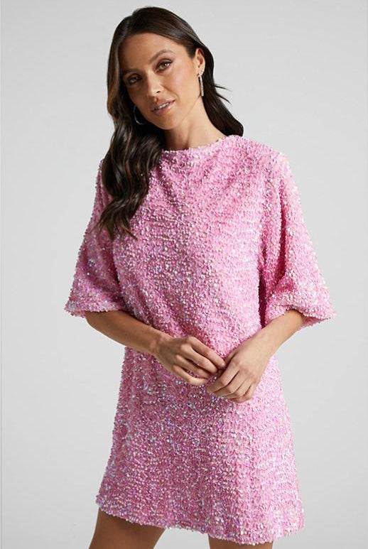 Pink Isolde plunge-back sequin embellished mini dress by Lumina Vancouver, featuring a fitted silhouette and shimmering sequins.