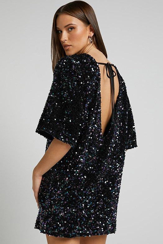 Pink Isolde mini dress by Lumina Vancouver with plunge back and sequin embellishments, fitted style, stylish party wear.
