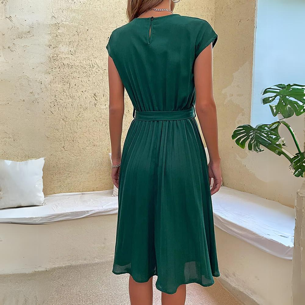 Pink Novae midi dress with waist tie from Lumina Vancouver, featuring a stylish and flattering fit for casual or dressy occasions.
