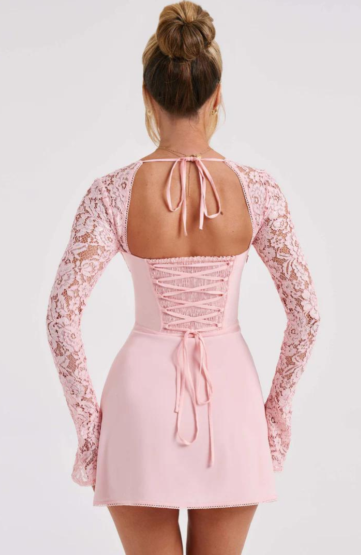 Red Dagny lace long sleeve mini dress by Lumina Vancouver, featuring elegant fitted design and detailed lace fabric.