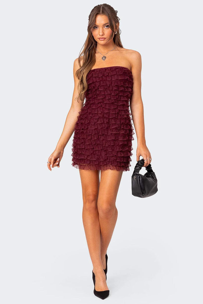 Red strapless ruffled mini dress by Lumina Wear, featuring a fitted silhouette and stylish design, perfect for summer occasions.
