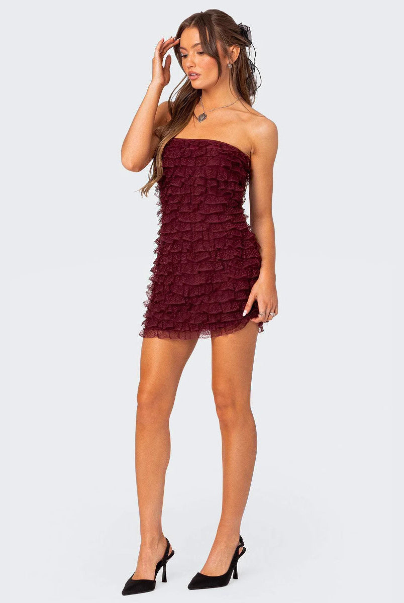 Red Lumina Wear Radegonde strapless ruffled mini dress with a fitted silhouette and playful ruffle details.