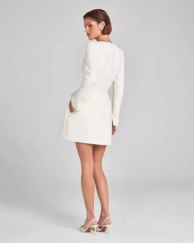 Lumina Wear Nova red tweed mini dress with pearl trim, featuring a fitted silhouette and stylish design for a chic look.