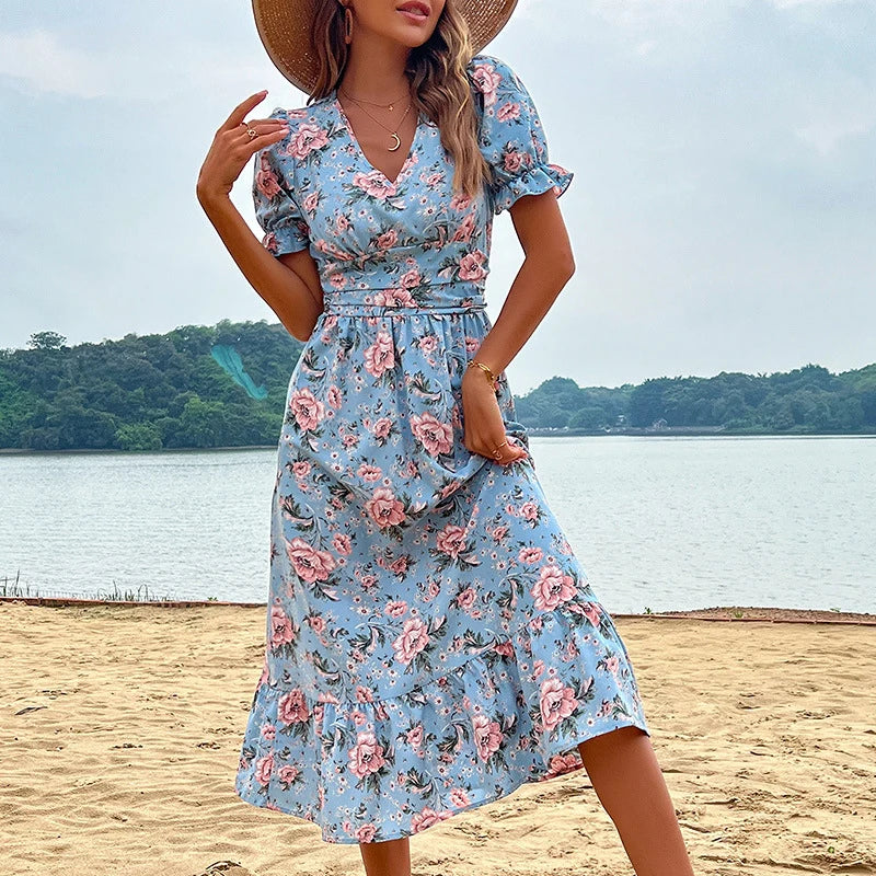 Lumina Vancouver Astra floral print midi dress, stylish mini dress with vibrant floral pattern and flowing fabric.