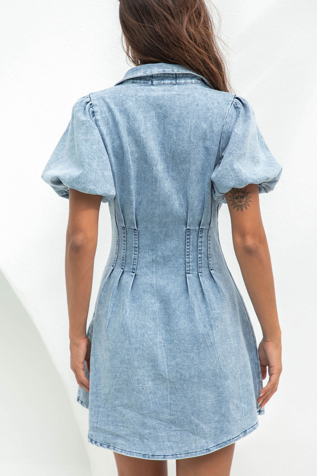 Lumina Vancouver Nova denim mini dress with button-down front, fitted silhouette, and classic blue denim fabric.