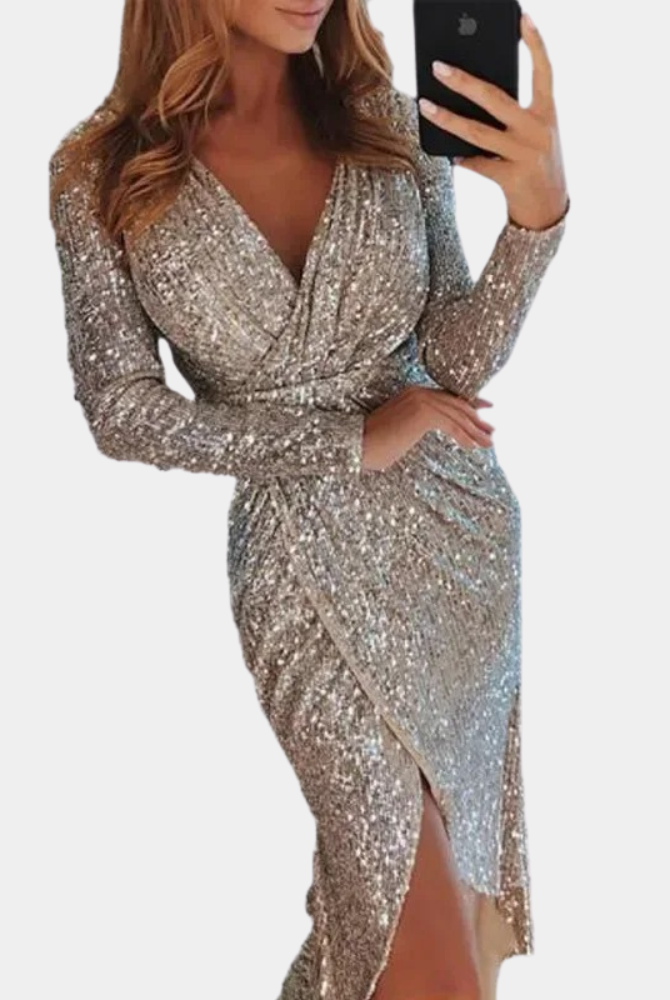Silver Elara sequin mini dress with wrap style from Lumina Wear, featuring a shimmering, fitted design for elegant evening wear.