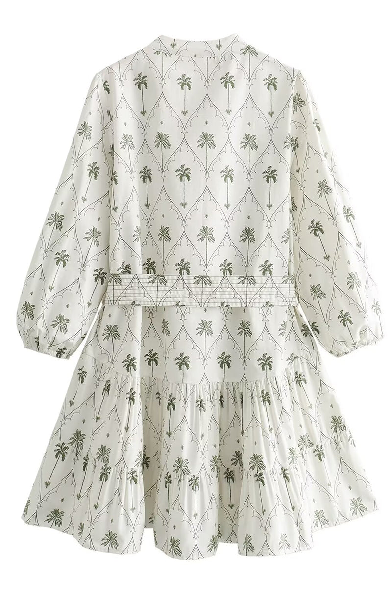 White and green Marin Willow wrap dress with V-neck from Lumina Vancouver, stylish mini dress for casual or semi-formal wear.