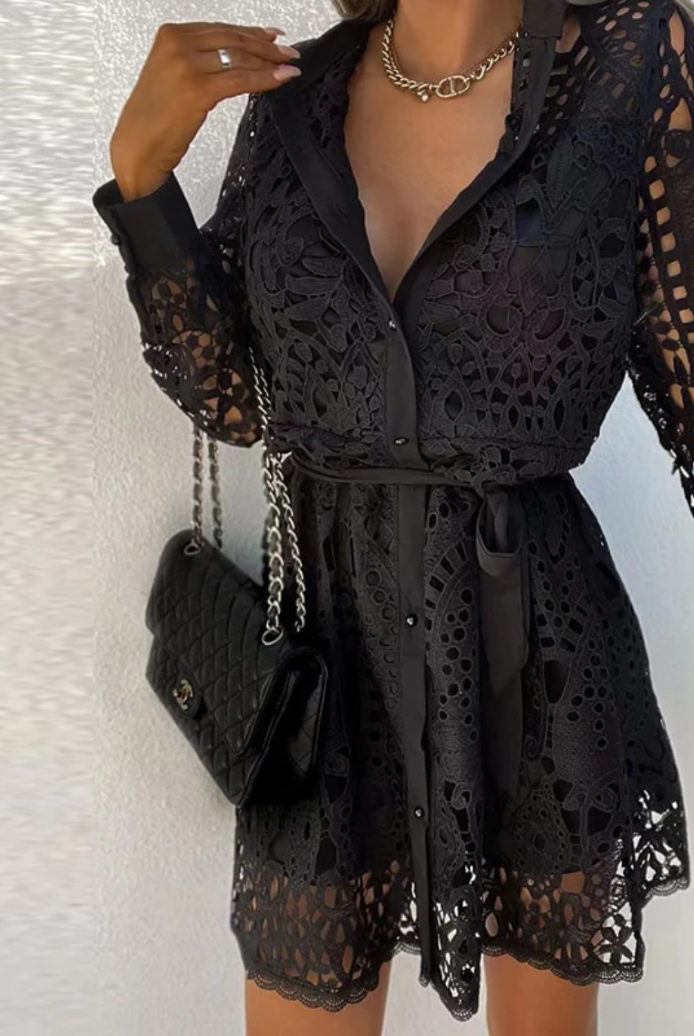 White Aurora knee-length lace dress by Lumina Vancouver featuring a belted waist and intricate lace details.