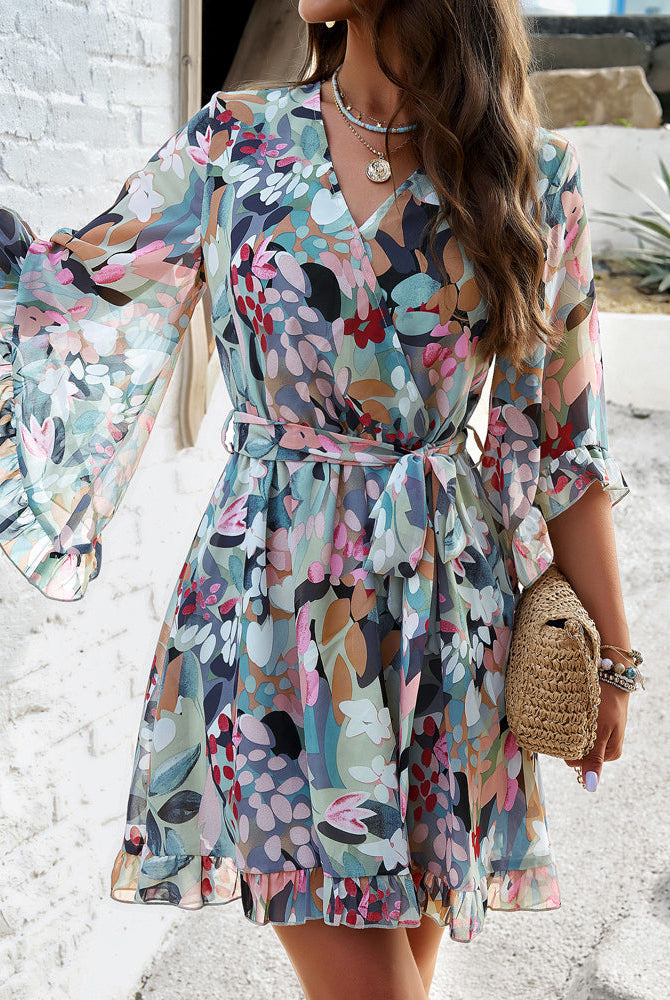 Lumina Wear women's floral V-neck mini dress in white, stylish and lightweight perfect for warm weather.