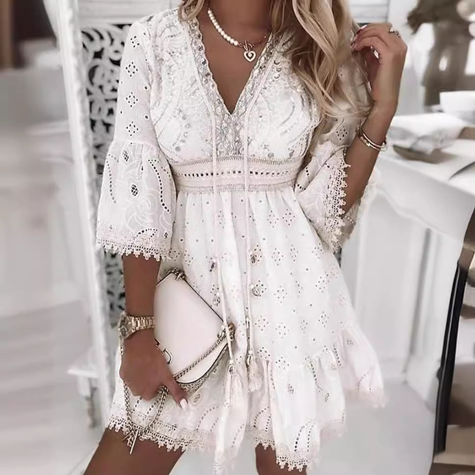 White Isadora Moonlight Muse V-neck mini dress by Lumina Vancouver, showcased on a mannequin.