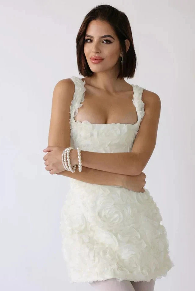 Lumina Wear Honoria mini dress with white 3D floral textured fabric, stylish short dress perfect for casual or summer wear.