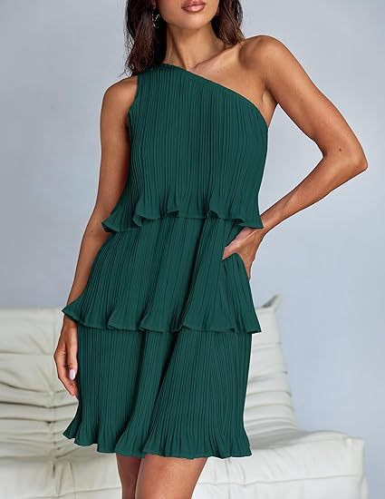 White Nova pleated one-shoulder mini dress by Lumina Vancouver, showcasing elegant draped fabric and stylish asymmetric design.