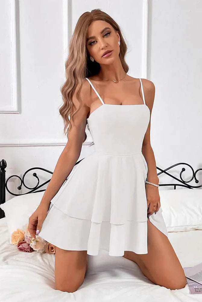 White Lumina Vancouver Noemie mini dress with spaghetti straps, sleeveless design, perfect for casual or summer wear.