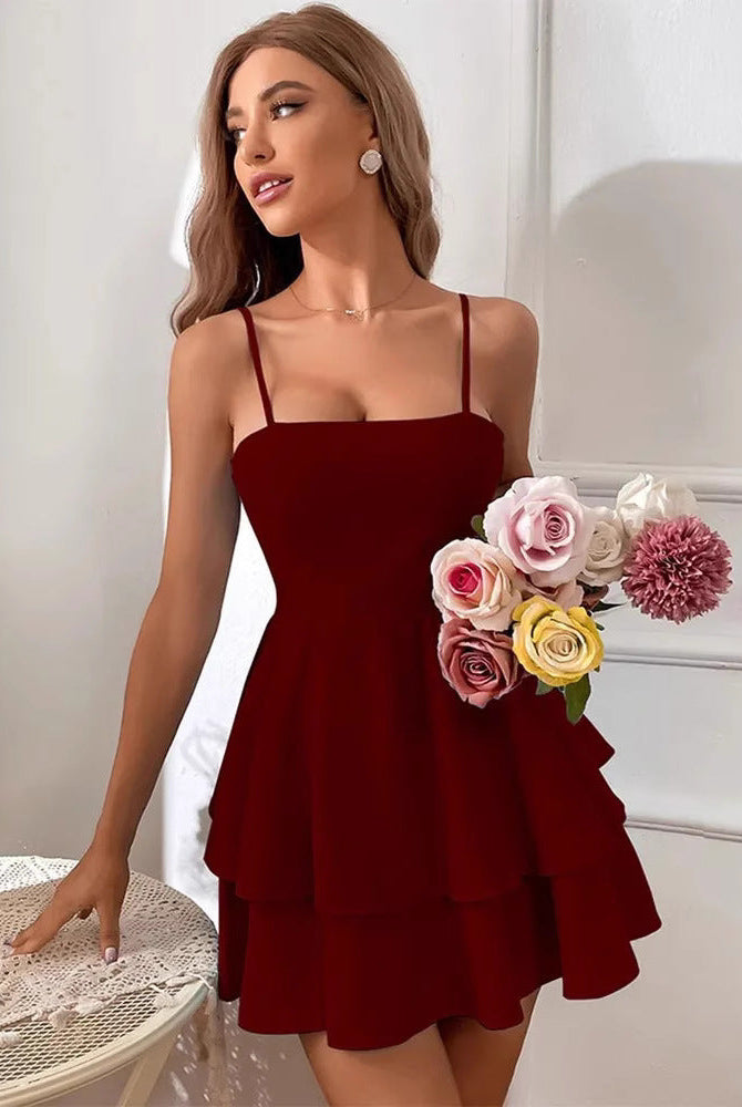 White Noemie mini dress with spaghetti straps by Lumina Wear, featuring a fitted silhouette and stylish design.