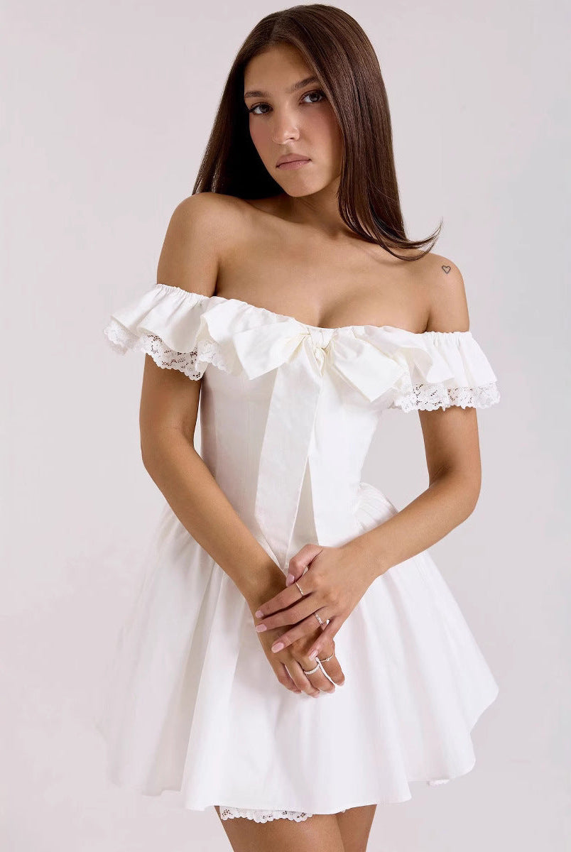 White Nova off-shoulder mini dress with A-line fit by Lumina Vancouver, shown on a model.