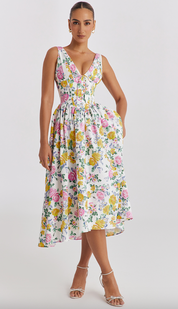 Yellow floral sleeveless mini evening dress with V-neck from Lumina Vancouver, perfect for elegant occasions.