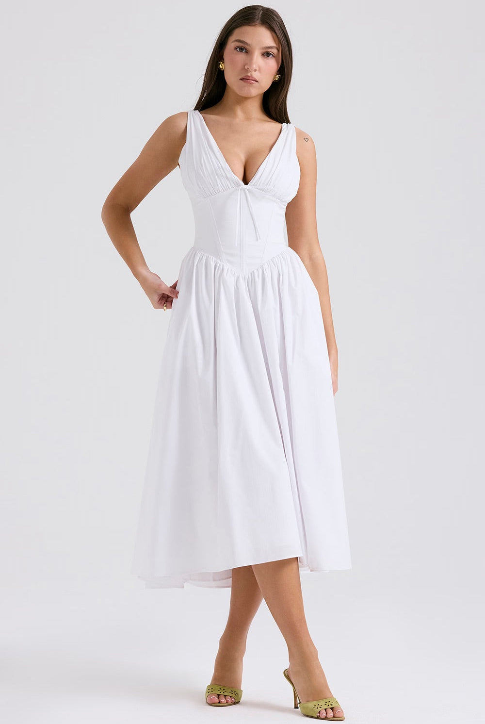 Yellow floral sleeveless mini evening dress with V-neck from Lumina Vancouver, featuring a stylish and elegant design.