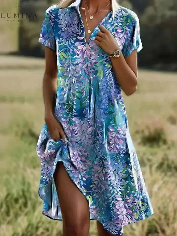 Lumina Vancouver Onerva boho vintage V-neck dress displayed on a model, featuring flowing fabric and bohemian style details.