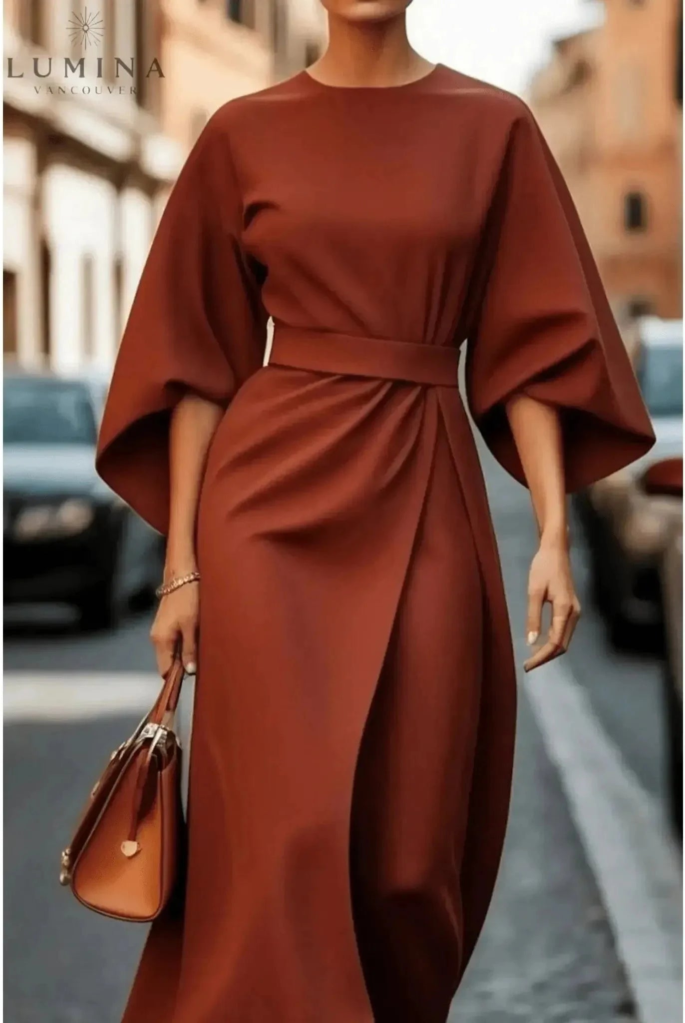 Navy blue Sonia elegant dress with belt by Lumina Wear, showcasing a fitted silhouette and stylish waist detail.