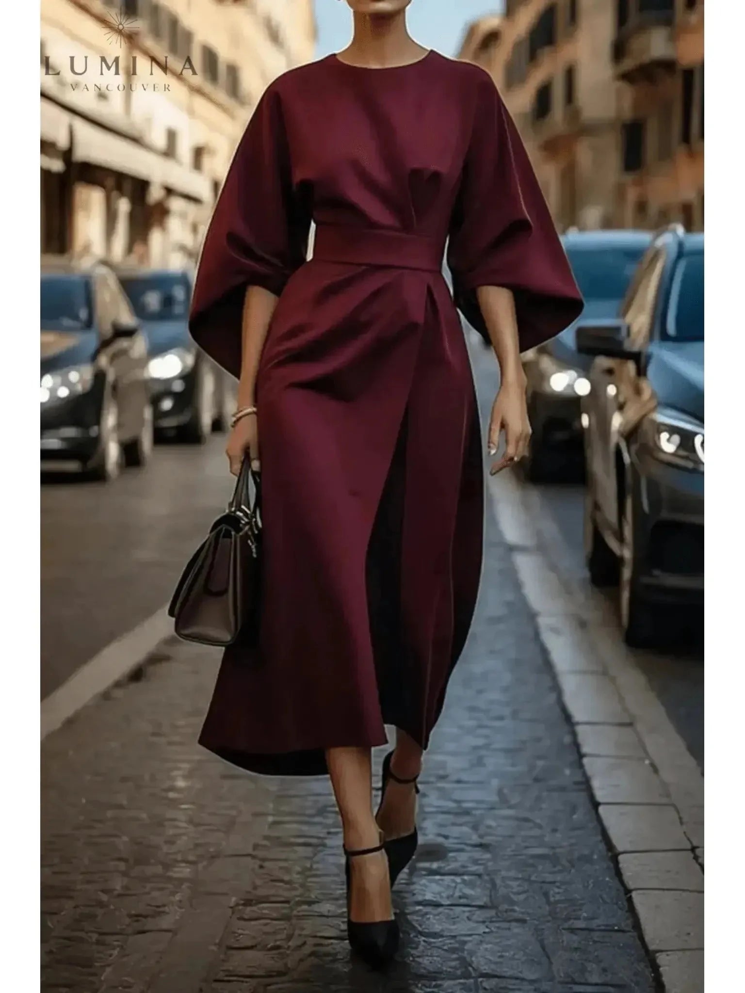 Navy blue Sonia elegant dress with belt by Lumina Vancouver, featuring a fitted waist and stylish design.