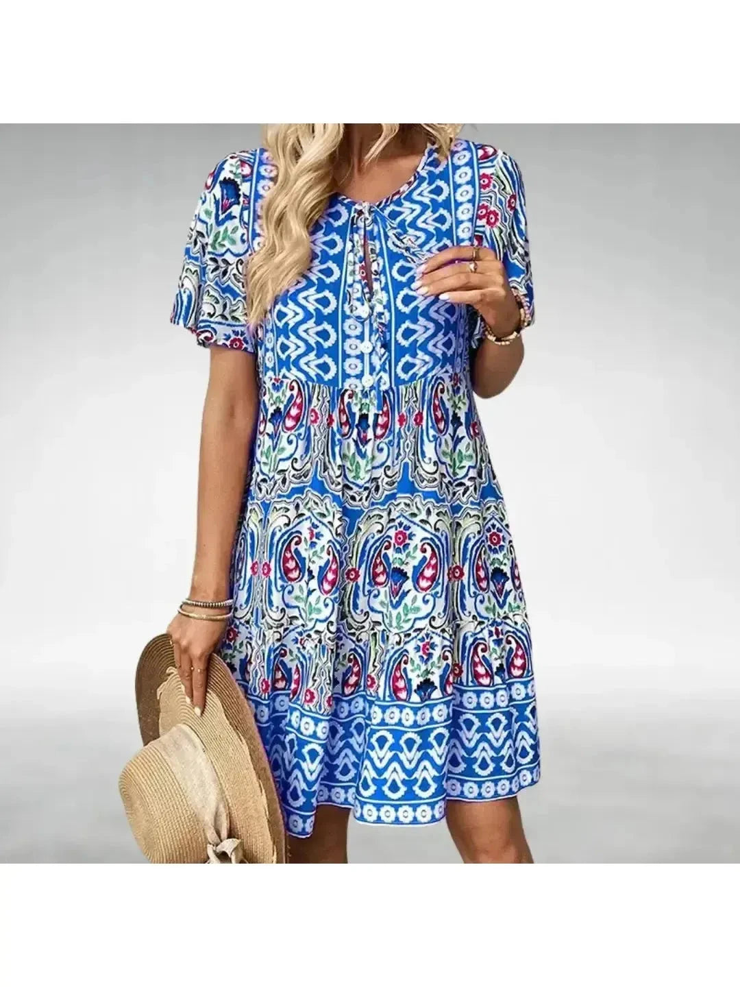 Lumina Vancouver orange women's elegant dress with a flowing design, perfect for spring and summer occasions.