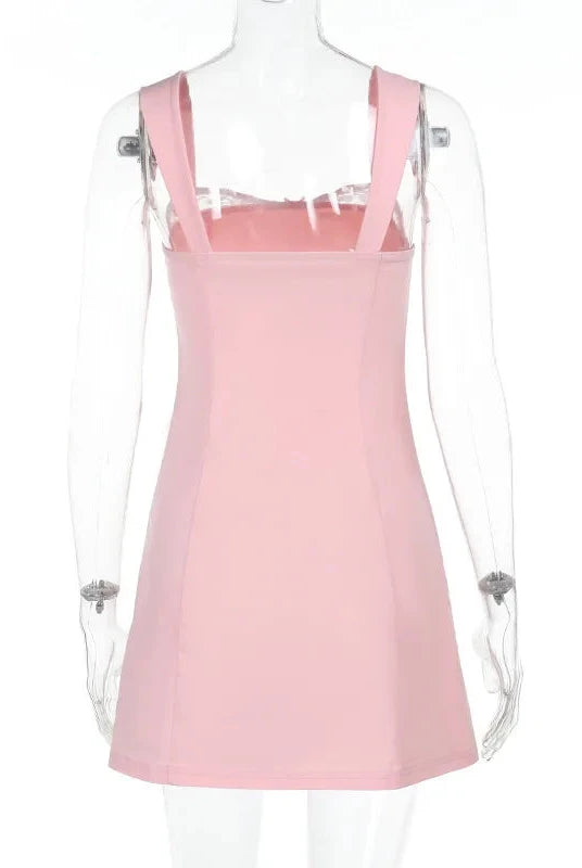 Pink satin mini dress with lace trim from Lumina Vancouver, featuring a fitted silhouette and delicate lace details.